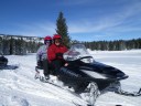 Don and Montie snowmobiling