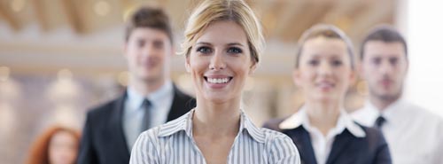 business woman standing with her staff at conference