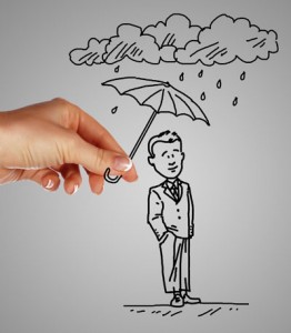 Man under rain holding umbrella
