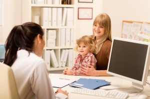 Pediatrician consultation mother with daughter