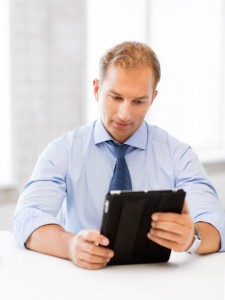 businessman with tablet pc in office