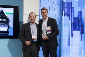 Rob Teel, right, Senior Vice President, Yardi Global Solutions, accepts a Digie Award for Voyager 7S.