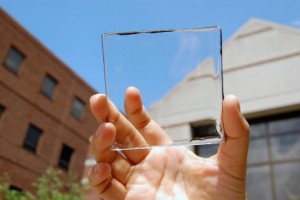 MSU doctoral student Yimu Zhao holds up a transparent luminescent solar concentrator module. Photo credits: Yimu Zhao via Michigan State University