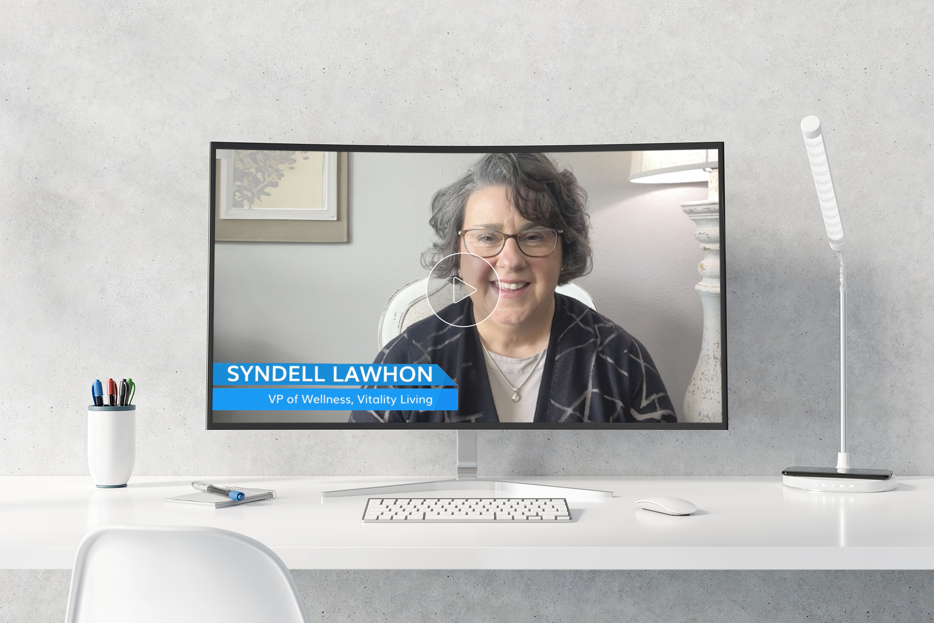 Image of Syndell Lawhon, VP of wellness, Vitality Living, on a computer