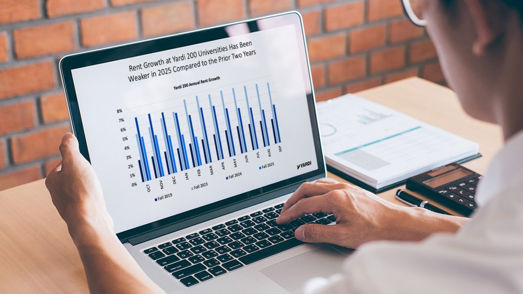 Laptop showing student housing webinar April 2025