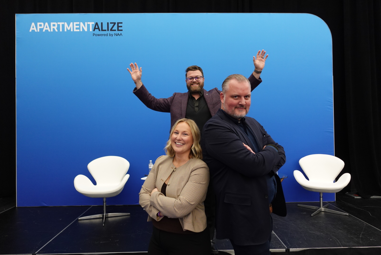 Three attendees at NAA Apartmentalize 2025