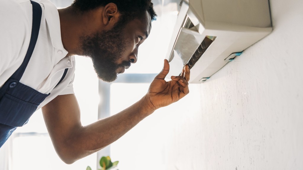 Man doing summer maintenance