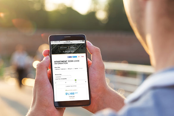 Renter looking at RentCafe property marketing software on mobile phone