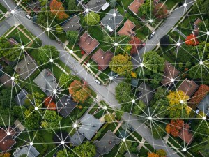 An image of houses on a street connected by lines