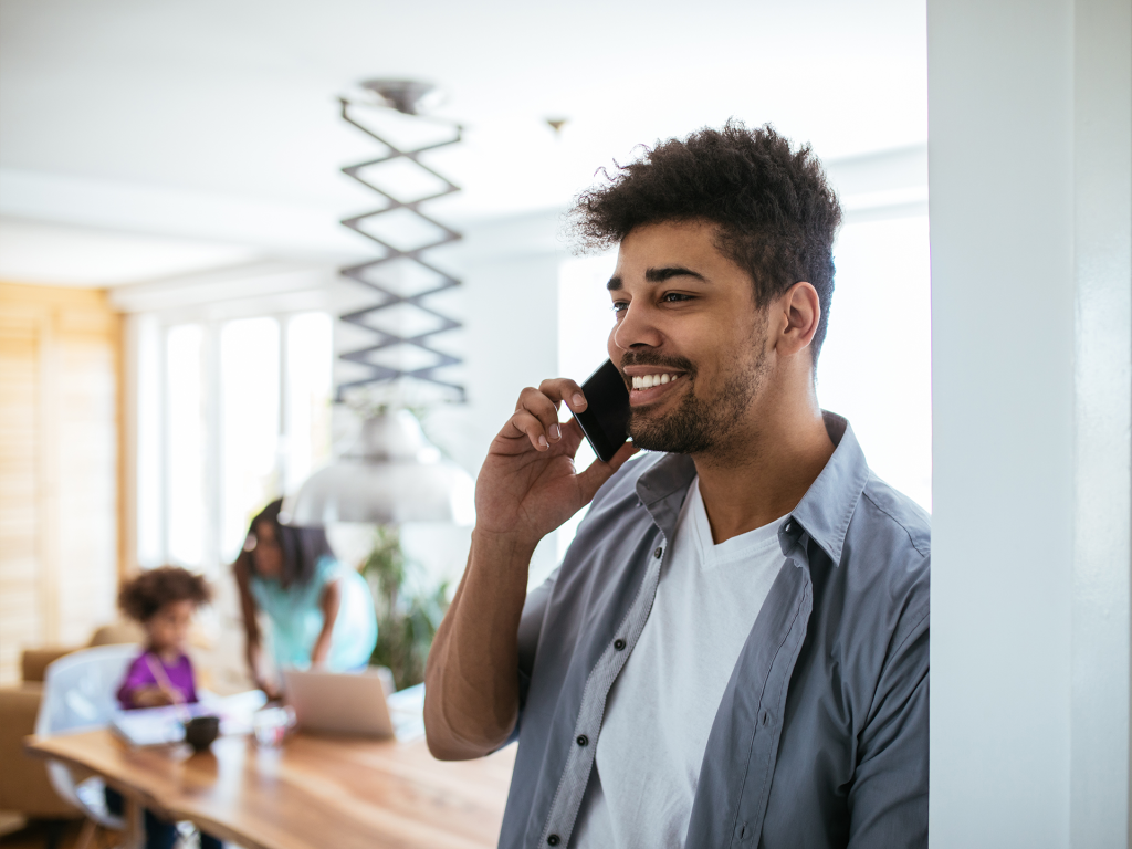 An apartment resident talking on the phone to a leasing agent using Contact IQ.
