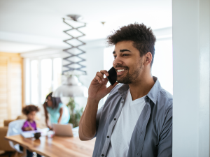 An apartment resident talking on the phone to a leasing agent using Contact IQ.