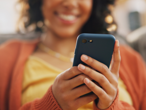 Woman using resident portal on mobile phone