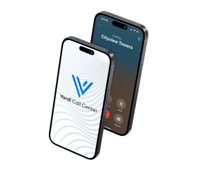Yardi Call Center being shown on a smart phone, with a phone dialing an apartment property behind it.