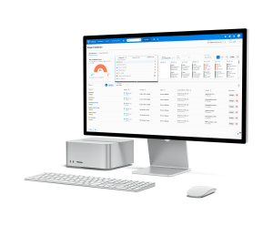 A desktop computer showing Yardi CRM IQ on the screen.